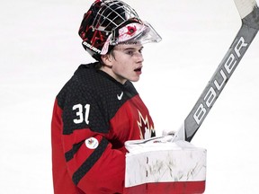 Team Canada goaltender Carter Hart celebrates his team's victory over Sweden on Jan. 4, 2017