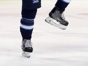 Mathieu Perreault started wearing protective shells on his skates after breaking a bone in his foot earlier this season.