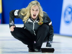 Skip Jennifer Jones reacts to her shot entering the house during Olympic curling trials action against Team McCarville on Dec. 7, 2017