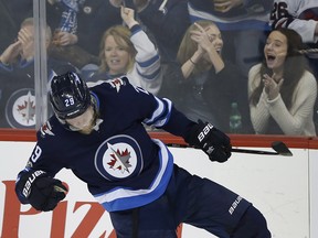 Jets winger Patrik Laine had three points on the night with a goal and two assists. (The Canadian Press)