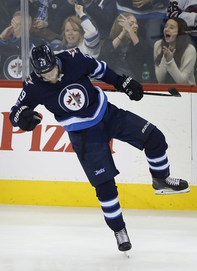 Jets winger Patrik Laine had three points on the night with a goal and two assists. (The Canadian Press)
