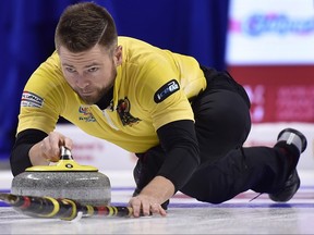 Team McEwen skip Mike McEwen makes a shot during a draw against Team Carruthers at the 2017 Roar of the Rings Canadian Olympic Curling Trials in Ottawa on Saturday, Dec. 2, 2017.
