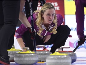 Skip Chelsea Carey of Calgary, Alta. calls to her sweepers during a draw against Team Englot at the 2017 Roar of the Rings Canadian Olympic Trials in Ottawa on Friday, Dec. 8, 2017.