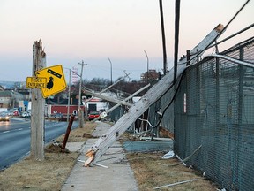 Damaged power lines are seen in Dartmouth, N.S., on Tuesday, Dec. 26, 2017. THE CANADIAN PRESS/Andrew Vaughan