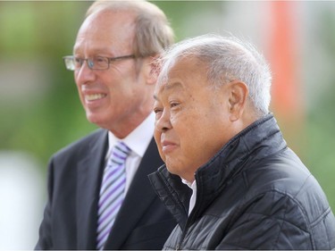 Winnipeg Mayor Sam Katz and Dr. Joseph Du (right) at the dedication of a portion of King Street being renamed after Dr. Du in 2013, Du has been one of the leaders of the local Chinese community for many years.