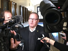 Families Minister Scott Fielding is leading a committee reviewing child welfare legislation and discusses its mandate in the hall of the Legislature Thursday, Dec. 21, 2017.
Tom Brodbeck/Winnipeg Sun