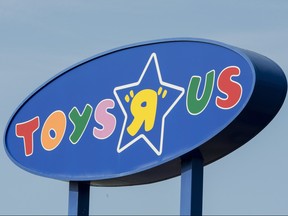 A Toys "R" Us sign is seen Tuesday, September 19, 2017. THE CANADIAN PRESS/Paul Chiasson ORG XMIT: pch102