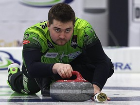 Skip Matt Dunstone delivers a stone during the Viterra provincial men's curling championship at the Stride Centre in Portage la Prairie on Wed., Feb. 8, 2017. Kevin King/Winnipeg Sun/Postmedia Network