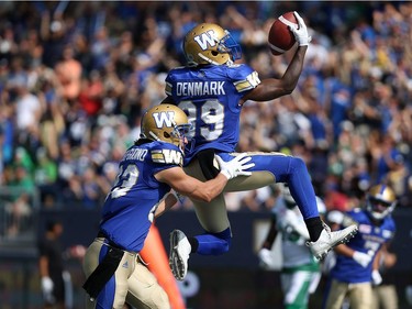 YEAR IN REVIEW: Winnipeg Blue Bombers WR Clarence Denmark celebrates his touchdown catch against the Saskatchewan Roughriders during the Banjo Bowl in Winnipeg with WR Julian Feoli-Gudino on Sat., Sept. 9, 2017. Kevin King/Winnipeg Sun/Postmedia Network ORG XMIT: POS1709091618336043