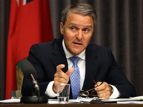Finance Minister Cameron Friesen said government is on track to reduce the size of its civil service by 8% over three years under a plan announced last year on Wednesday. Kevin King/Winnipeg Sun/Postmedia Network