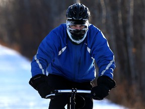 A cyclist exit the Assiniboine Forest trail on a chilly day in Winnipeg on Wed., Dec. 27, 2017. Kevin King/Winnipeg Sun/Postmedia Network