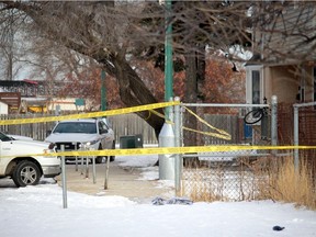 An article of clothing lays in the snow between a portion of property taped off by RCMP following an early morning shooting on Tuesday, Dec. 5, 2017, at Poplar Bay in the north end of Portage la Prairie.When officers arrived on scene, an injured male, 26, from Portage had been transported to hospital with non-life threatening injuries. Portage la Prairie is 71 kms west of Winnipeg.