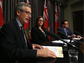 Trade Minister Blaine Pedersen (left) speaks during a press conference on the sale of cannabis at the Manitoba Legislative Building on Tuesday. Justice Minister Heather Stefanson and Municipal Relations Minister Jeff Wharton sit to his left.