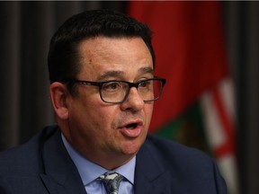 Municipal Relations Minister Jeff Wharton speaks during a press conference on the sale of cannibas at the Manitoba Legislative Building in Winnipeg on Tues., Dec. 4, 2017. Kevin King/Winnipeg Sun/Postmedia Network