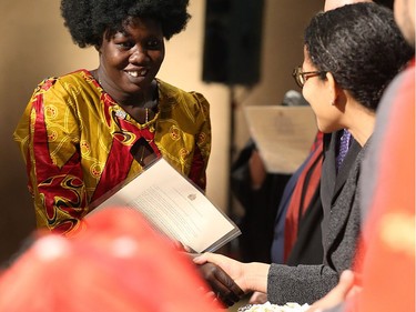 YEAR IN REVIEW: Rachel Adior, originally from South Sudan, receives her certificate of citizenship during a special citizenship ceremony at the Canadian Museum of Human Rights in Winnipeg on Sun., Dec. 10, 2017. Kevin King/Winnipeg Sun/Postmedia Network ORG XMIT: POS1712101424494996