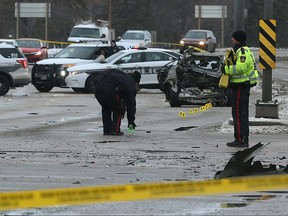 Police investigate following a motor vehicle collision near the intersection of St. Anne's Road and Fermor Avenue in Winnipeg on Wed., Dec. 13, 2017. Kevin King/Winnipeg Sun/Postmedia Network