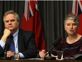 Lori Lamont (right), Winnipeg Regional Health Authority acting chief operating officer, speaks during a press conference on the release of the wait-times task force report at the Manitoba Legislative Building in Winnipeg on Wed., Dec. 20, 2017. Shared Health CEO Dr. Brock Wright is at left. Kevin King/Winnipeg Sun/Postmedia Network