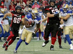 Winnipeg's Chris Randle evades all of Ottawa's offence and runs in his touchdown after a fumble recovery during first-half action in the Ottawa Redblacks matchup with the Winnipeg Blue Bombers at TD Place in Ottawa Friday (August 4, 2017) Julie Oliver/Postmedia