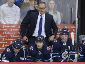 WINNIPEG, MANITOBA - OCTOBER 4: Head coach Paul Maurice of the Winnipeg Jets looks to the ice after being scored on by the Toronto Maple Leafs during NHL action on October 4, 2017 at the Bell MTS Place in Winnipeg, Manitoba.