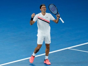 Roger Federer of Switzerland celebrates winning championship point in his men's singles final match against Marin Cilic of Croatia on day 14 of the 2018 Australian Open at Melbourne Park on January 28, 2018 in Melbourne, Australia.