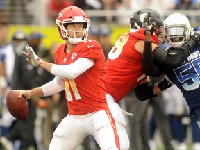 AFC quarterback Alex Smith (11) of the Kansas City Chiefs looks to pass during the Pro Bowl against the NFC Sunday, Jan. 28, 2018, in Orlando, Fla. (AP Photo/Steve Nesius)