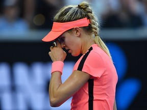 Canada's Eugenie Bouchard reacts during their women's singles second round match against Romania's Simona Halep on day four of the Australian Open tennis tournament in Melbourne on January 18, 2018. AFP/Getty Images
