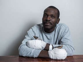 Kangni Fiowole-Kouevi is shown at the Hospitality House Refugee Ministry in Winnipeg on Tuesday. Fiowole-Kouevi says he was not sure he had made it to Canada when, struggling to work with frozen fingers in -23C weather, he dialled 9-1-1 on his cellphone.
