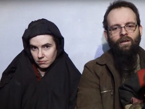 Screen capture on YouTube of Taliban video showing hostages Caitlan Coleman and Joshua Boyle in December 2016.