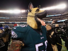 Defensive end Chris Long of the Philadelphia Eagles celebrates as he walks off the field after their 15-10 win over the Atlanta Falcons in the NFC Divisional Playoff game at Lincoln Financial Field on January 13, 2018 in Philadelphia. (Al Bello/Getty Images)