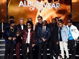 Bruno Mars (front C) accepts Album of the Year for "24K Magic" with production team onstage during the 60th Annual Grammy Awards at Madison Square Garden on Jan. 28, 2018 in New York City. (Kevin Winter/Getty Images for NARAS)