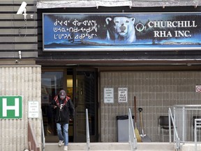 People exit a community centre in Churchill.