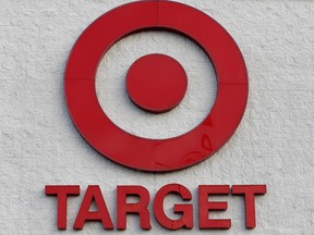 FILE - This file photo shows a Target retail chain logo on the exterior of a Target store. (AP Photo/Steven Senne, File)
