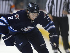 A source has confirmed the Jets will be without defenceman Jacob Trouba for an extended period of time because of an ankle injury. (Kevin King/Winnipeg Sun)