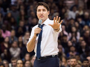 Prime Minister Justin Trudeau answers questions from the public during his town hall meeting in Hamilton, Ont., on Wednesday, Jan. 10, 2018. THE CANADIAN PRESS/Nathan Denette