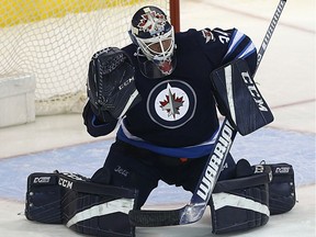 The Winnipeg Jets re-assigned the goaltender Michael Hutchinson to the Manitoba Moose, Friday, so he can take part in this weekend's AHL all-star game.