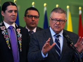 Public Safety Minister Ralph Goodale speaks during an announcement of increased funding for First Nations policing at the Neeginan Centre on Higgins Avenue in Winnipeg on Wed., Jan. 10, 2018, with Winnipeg Centre MP Robert-Falcon Ouellette (left) listening in. Kevin King/Winnipeg Sun/Postmedia Network