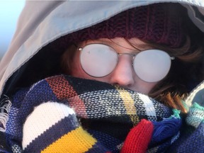 Athena Atwar's glasses fog in extreme cold in Winnipeg. Friday.
