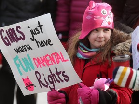 A group of approximately 300 people rallied at City Hall, in Winnipeg, for the Winnipeg Women's March.  6 year old Laine, from Winnipeg, was one of the participants. Saturday, January 20, 2018.   Sun/Postmedia Network