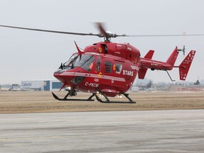 A STARS helicopter lifts off following a press conference at the Richardson International Airport in Winnipeg in 2011.