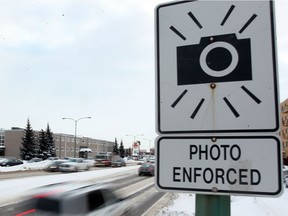 A photo radar sign is seen on Grant Avenue near Wilton in Winnipeg, Man. Tuesday Feb. 05, 2013. Speeding infractions in the area have gone down 71% in the last year. BRIAN DONOGH/WINNIPEG SUN/QMI AGENCY