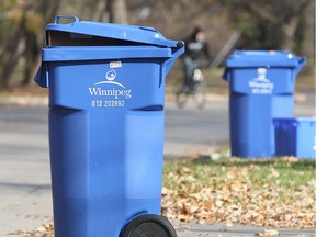 Recycling bins that had not been picked up line Wellington Crescent  in Winnipeg Saturday October 06, 2012. BRIAN DONOGH/WINNIPEG SUN/QMI AGENCY