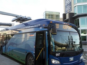 An electric bus charges at the James Armstrong Richardson Airport bus charging station. The Winnipeg Airports Authority announced Friday they will add public electric-charging stations for taxis and public parking. ERIN DEBOOY/Winnipeg Sun/Postmedia Network