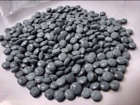 Fentanyl pills are shown in an undated police handout photo.