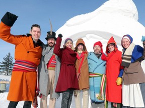 The Festival du Voyageur officially opens Voyageur Park in Winnipeg, Man., on Thursday, Feb. 15, 2018. The 49th annual Festival, which is regarded as Western Canada's largest winter festival runs Feb. 16 to 25. Pictured: Festival du Voyageur executive director Darrel Nadeau, Festival du Voyageur official family member Christian Perron, Minister of Sport, Culture and Heritage Hon. Cathy Cox, official family member Manu Perron, Festival du Voyageur board president Simon Normandeau, official family member Felix Perron, and official family member Nicole Beaudry. Missing: Official family member Vronic Beaudry. (Brook Jones/Postmedia Network)