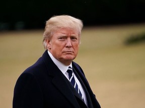 (FILES) In this file photo taken on Feb. 1, 2018 U.S. President Donald Trump walks across the South Lawn upon return to the White House in Washington, D.C. (MANDEL NGAN/AFP/Getty Images)