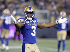 Winnipeg Blue Bombers' Kevin Fogg (3) gestures to the crowd while playing against the Edmonton Eskimos during the second half of CFL football action in Winnipeg, Thursday, August 17, 2017.