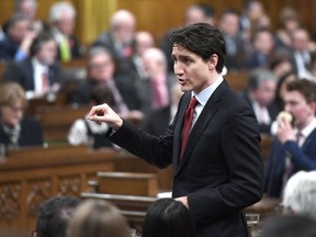 Prime Minister Justin Trudeau rises during Question Period in the House of Commons on Parliament Hill in Ottawa on Wednesday, Feb. 14, 2018.