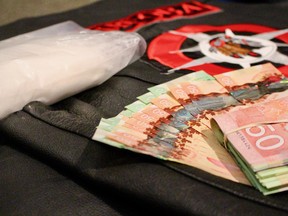 RCMP seized 567 grams of cocaine, a large sum of cash and a Manitoba Warriors full-patch vest over a months-long investigation title Project Deadbolt, which has led to six arrests stemming from a drug-trafficking network between Winnipeg and Grand Rapids. 
Scott Billeck/Winnipeg Sun