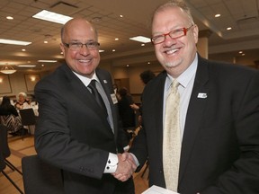 Winnipegger Michael Schlater (left), shakes hands with Hon. Kelvin Goertzen, Minister of Health, Seniors and Active Living, in Winnipeg today. Schlater and his wife Lilibeth gave $2 million to create a pediatric epilepsy and pediatric neurosurgery program in Winnipeg, last May. The unit officially opened Friday.