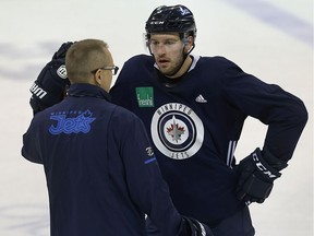 Tucker Poolman has a word with head coach Paul Maurice during Winnipeg Jets practice at Bell MTS Place in Winnipeg on Mon., Feb. 5, 2018. Poolman will likely get his first playoff action tonight. Kevin King/Winnipeg Sun files